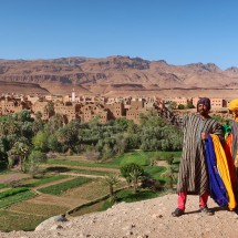 Two men in traditional clothing at the viewpoint Ait Boujane at the entrance of the Todra Gorge